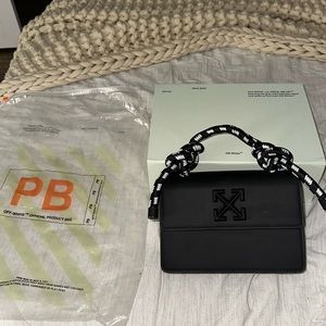 Offwhite Jitney 1.4 bag with original packaging and cross body strap